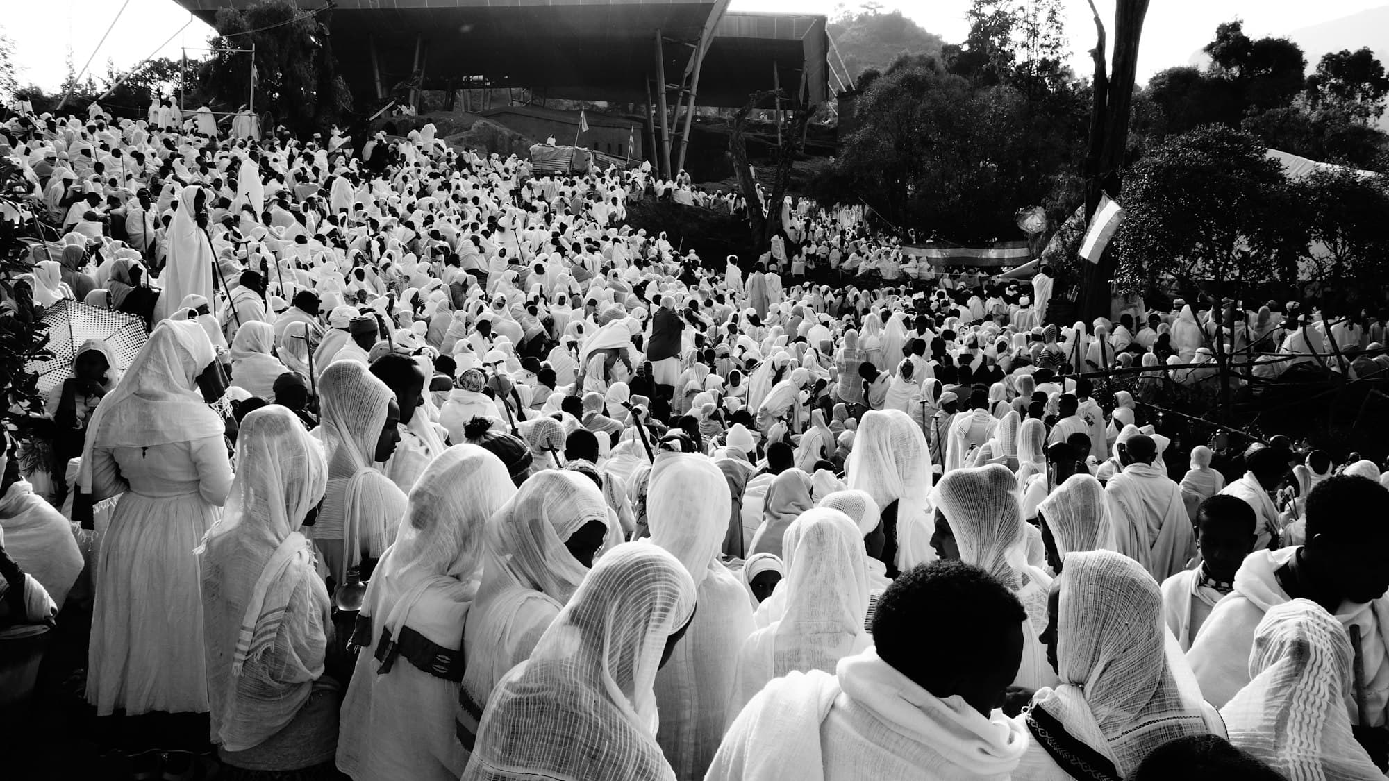 Ethiopian Orthodox worshippers dressed in white netela shawls, the traditional attire for Genna, Ethiopian Christmas